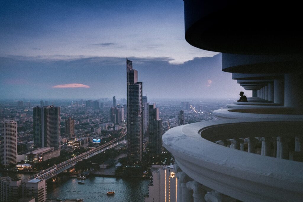 Bangkok city skyline at dusk over the Chao Phraya river