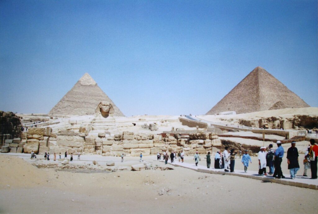 The Great Sphinx and the Pyramids of Khafre and Khufu at Giza under a clear winter sky