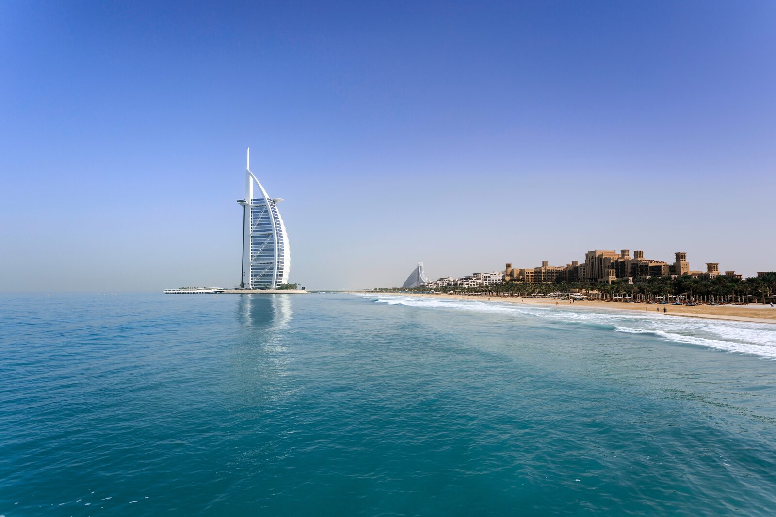 Burj Al Arab hotel and Jumeirah Beach on a clear day in Dubai