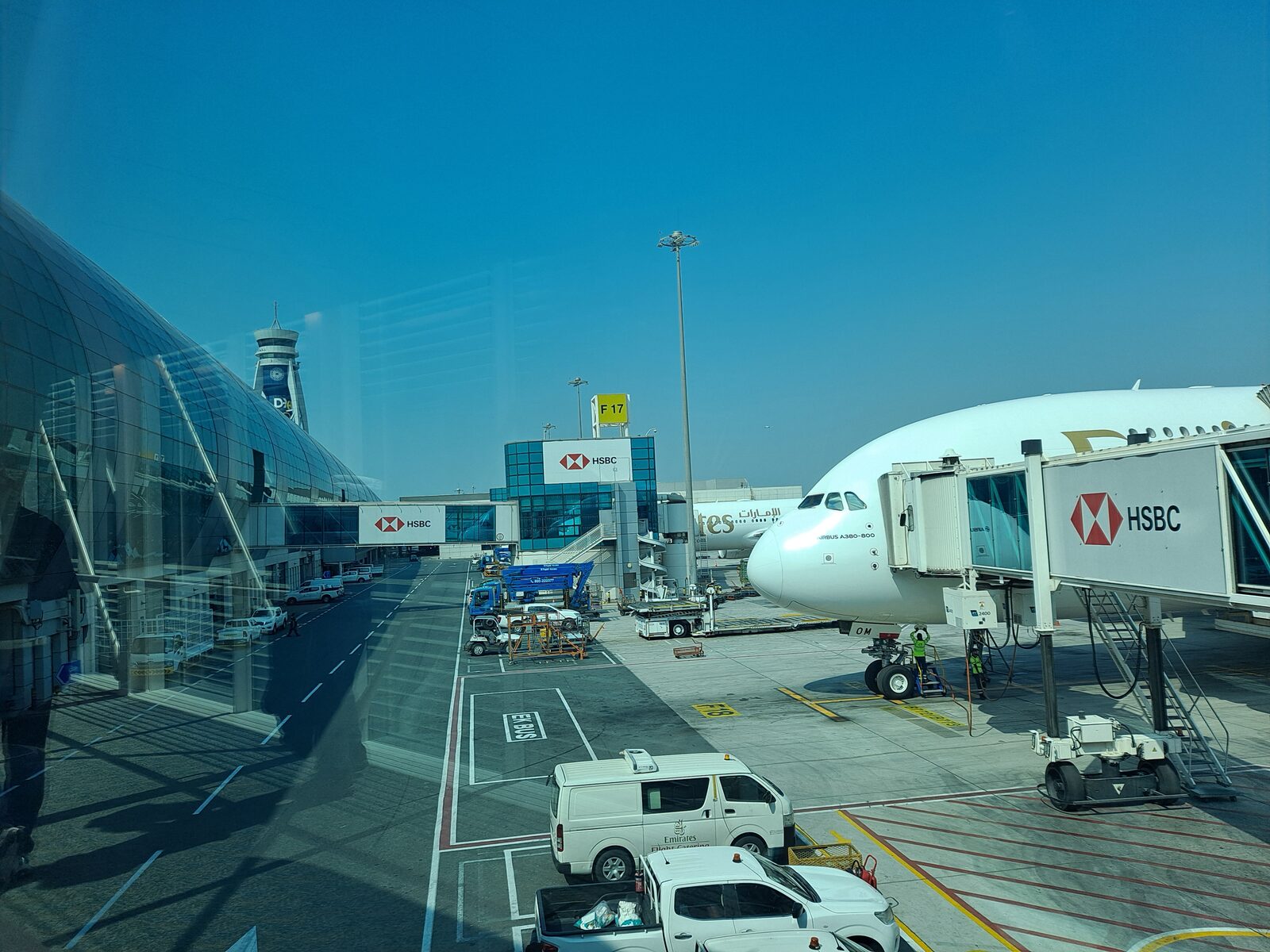 Dubai International Airport DXB Terminal 3 with an Emirates A380 parked at the gate