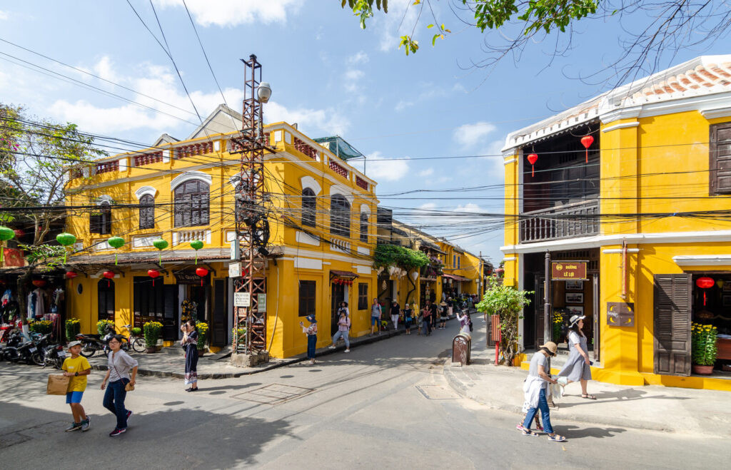 Yellow heritage shophouses and red lanterns in Hoi An ancient town, central Vietnam