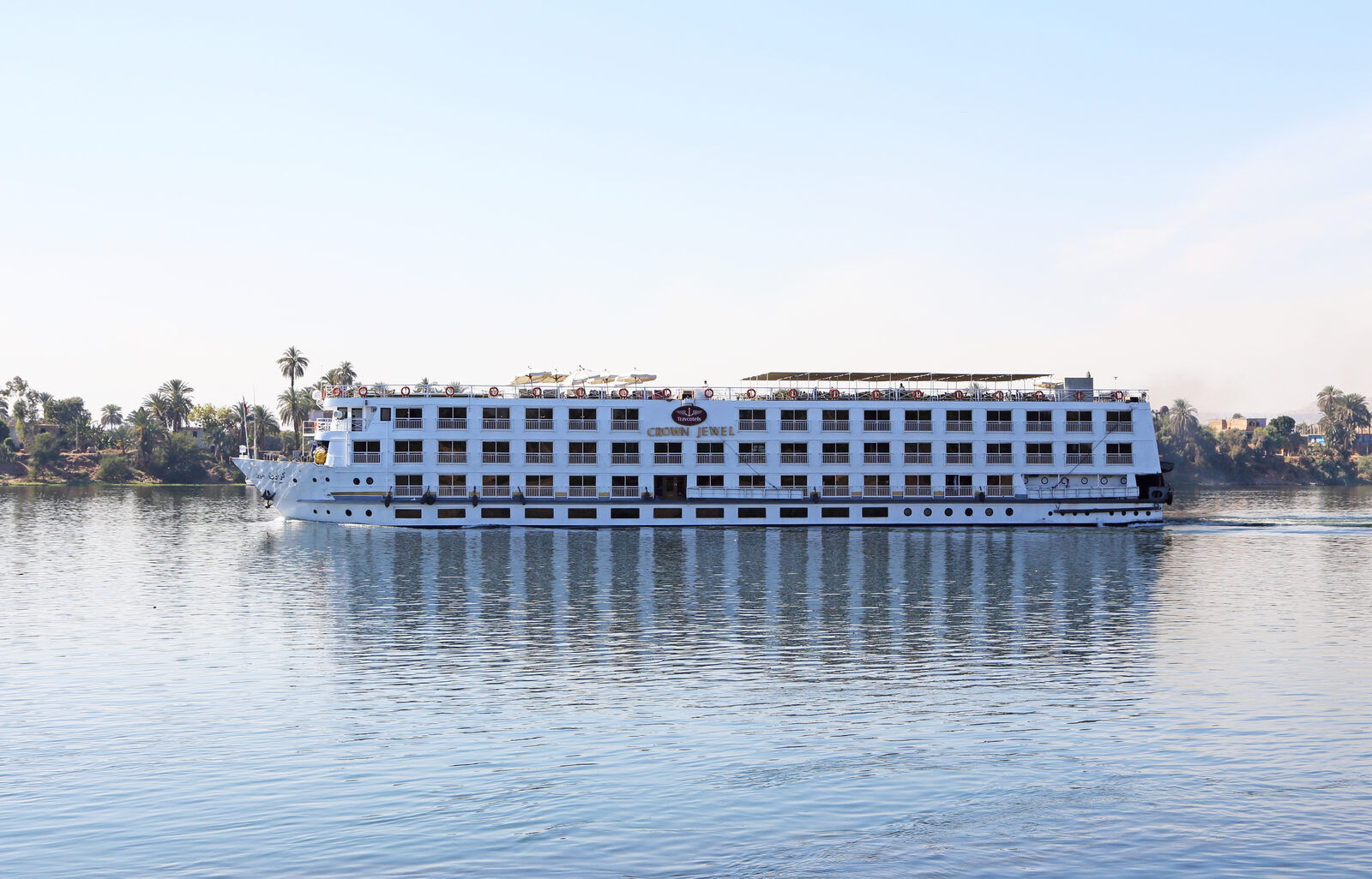 A Nile cruise ship sailing the river between Luxor and Aswan, Egypt