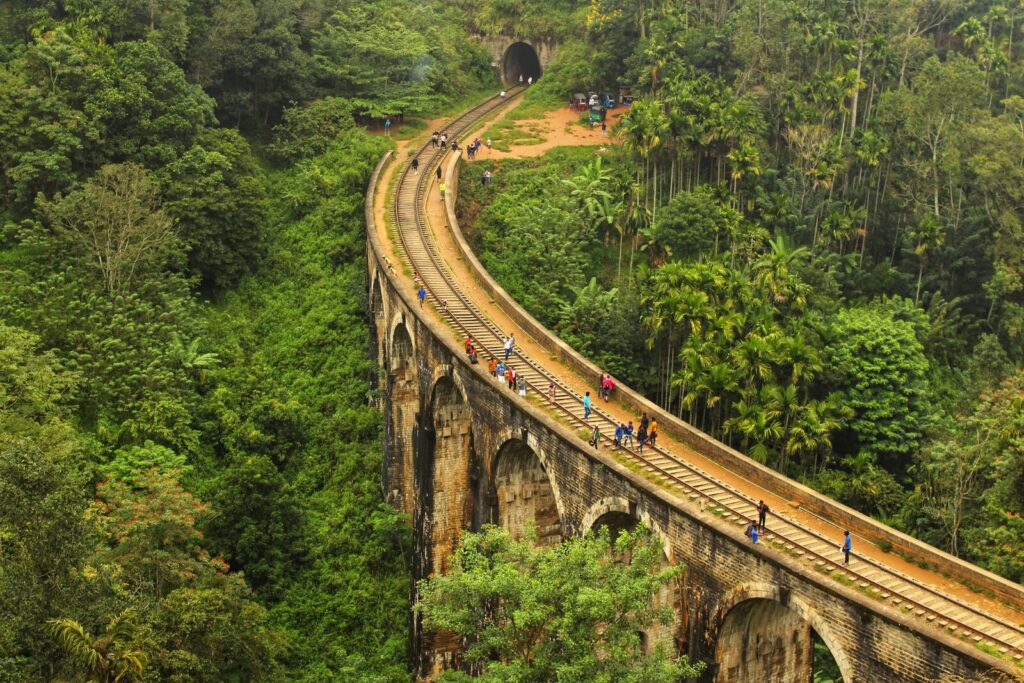 Train crossing the Nine Arch Bridge in Ella, Sri Lanka
