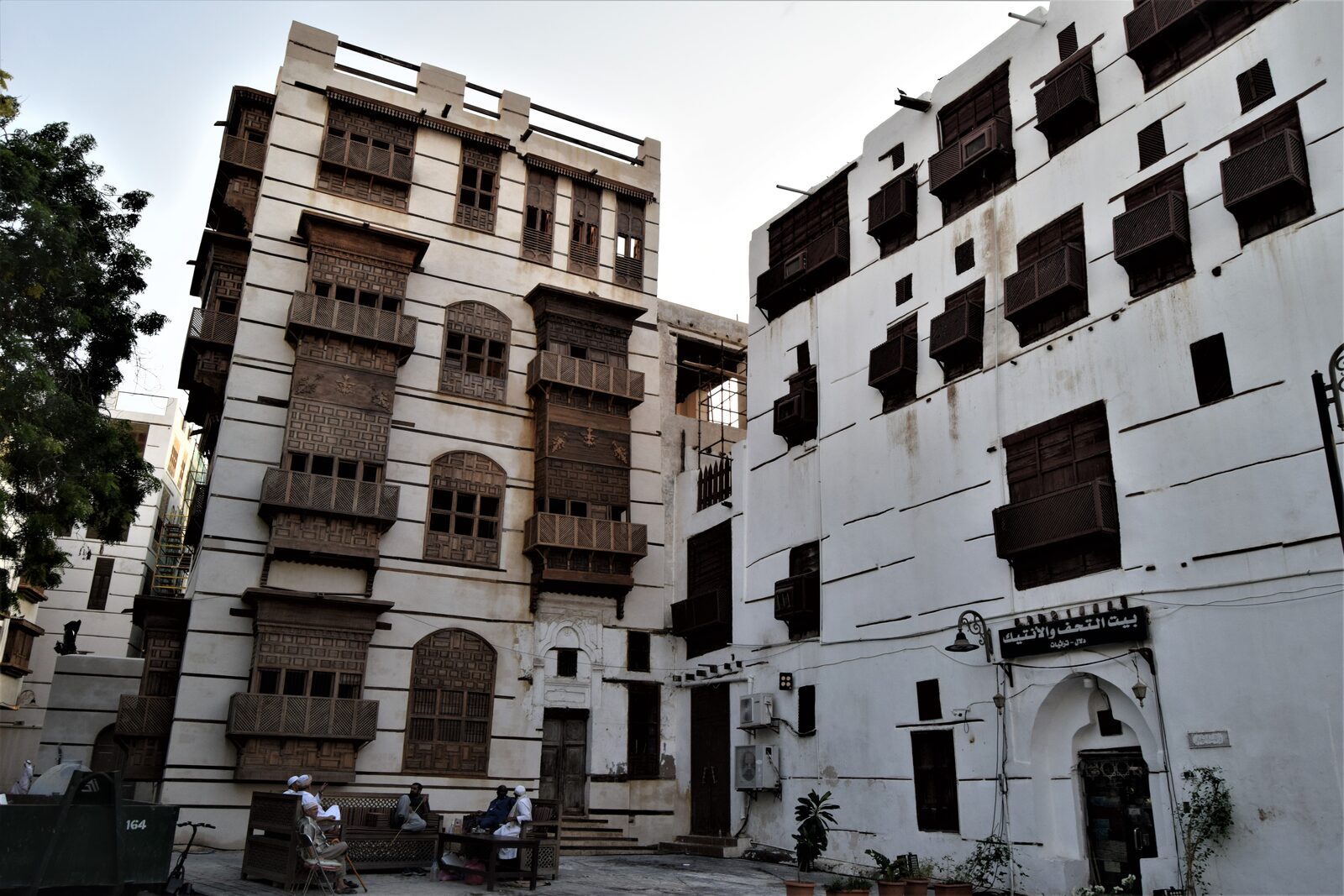 Coral-stone houses with traditional wooden rawasheen balconies in historic Al-Balad, Jeddah, Saudi Arabia