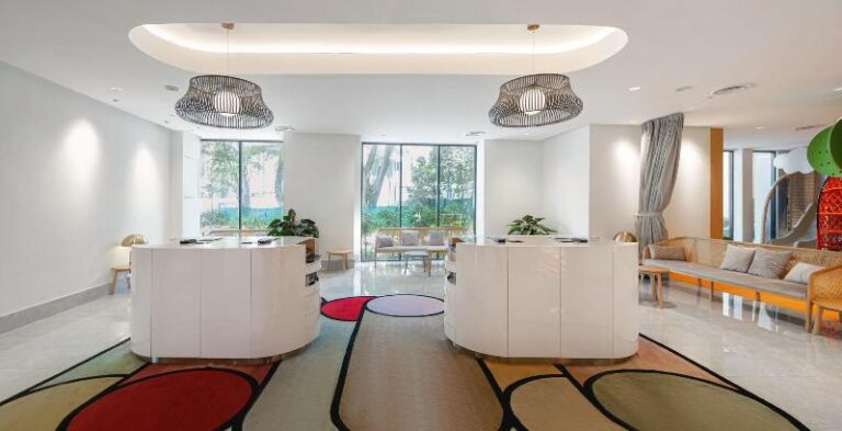 Colourful lounge seating area at Furama RiverFront Singapore