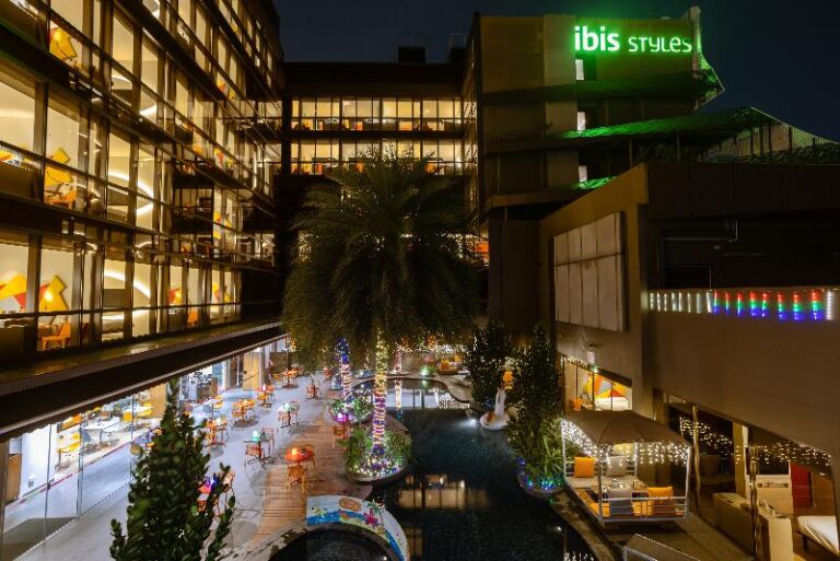 ibis Styles signage on the hotel exterior at night, Macpherson Road Singapore