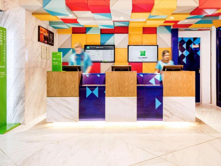 Colourful reception desk at ibis Styles Singapore On Macpherson