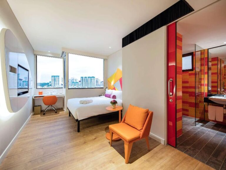 Twin-bed guest room at ibis Styles Singapore On Macpherson