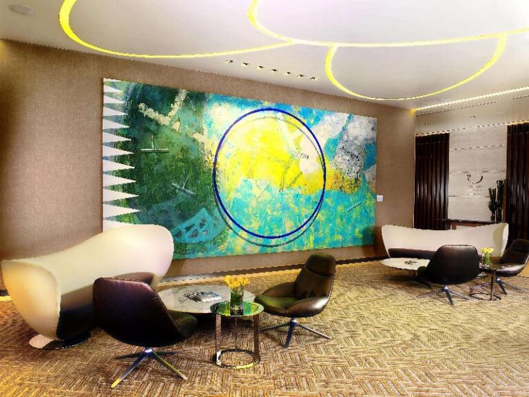 Lounge seating beneath a mural at One Farrer Hotel Singapore