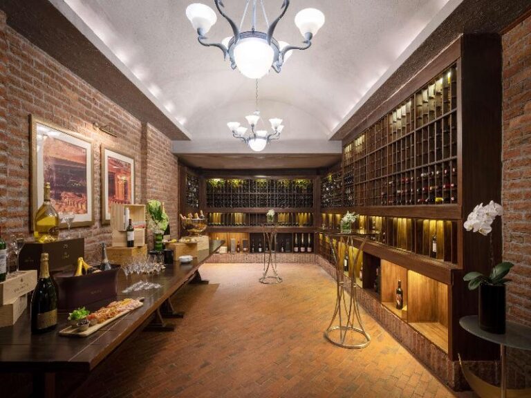 Private dining room lined with wine cabinets at Shangri-La Singapore
