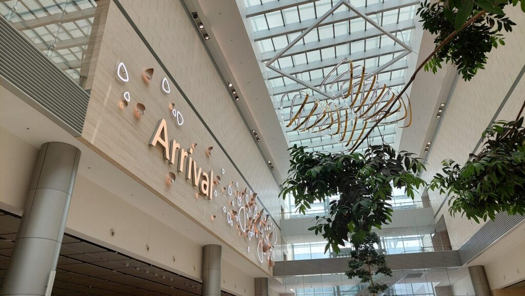 The Arrival sign and skylights in the Terminal 4 arrival hall at Changi Airport